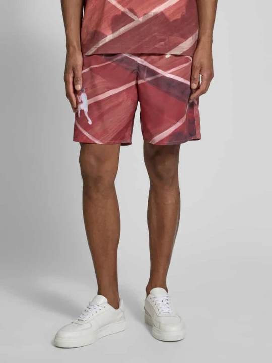 Zdjęcie produktu Szorty dresowe o kroju regular fit z naszywką z logo Lacoste