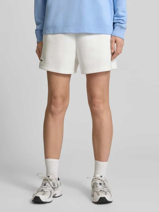 Zdjęcie produktu Szorty dresowe w kroju regular fit z czystej bawełny Lacoste Złamany biały
