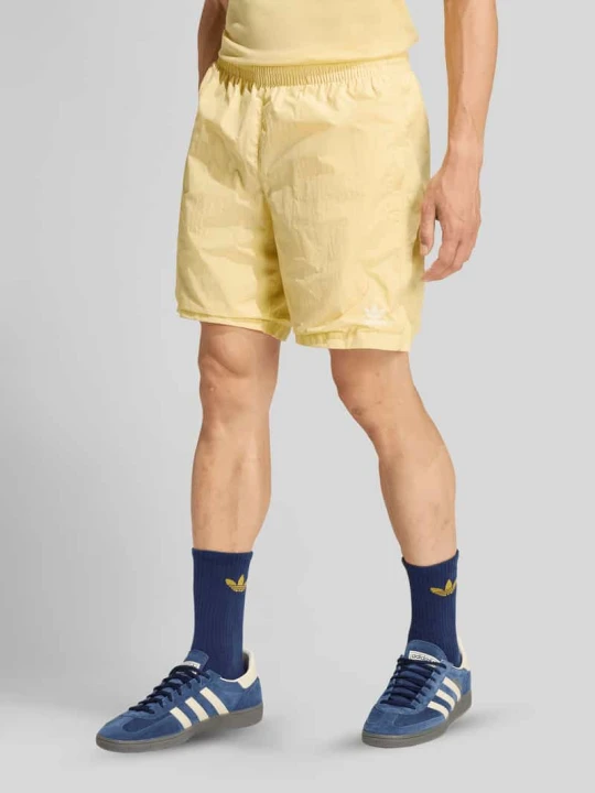 Zdjęcie produktu Szorty dresowe z czystej bawełny adidas Originals Jasnożółty