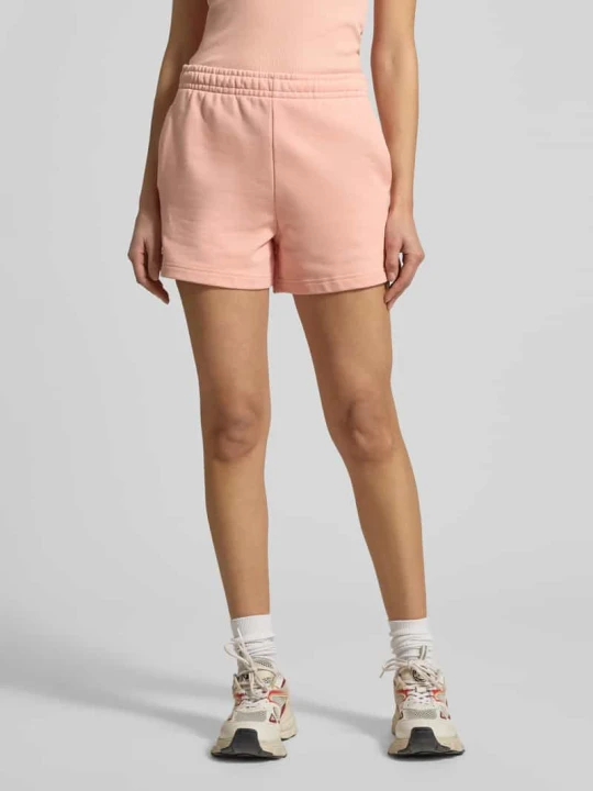 Zdjęcie produktu Szorty dresowe z czystej bawełny o kroju regular fit Lacoste Morelowy