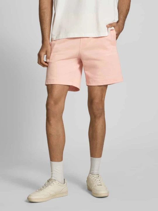 Zdjęcie produktu Szorty dresowe z haftem model 'KARL' Jack&Jones Morelowy