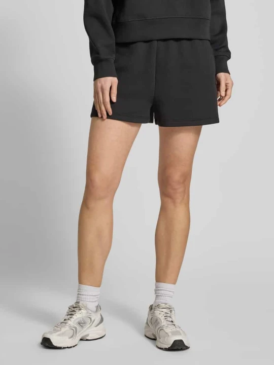 Zdjęcie produktu Szorty dresowe z mieszanki bawełny, krój regular fit Lacoste Czarny