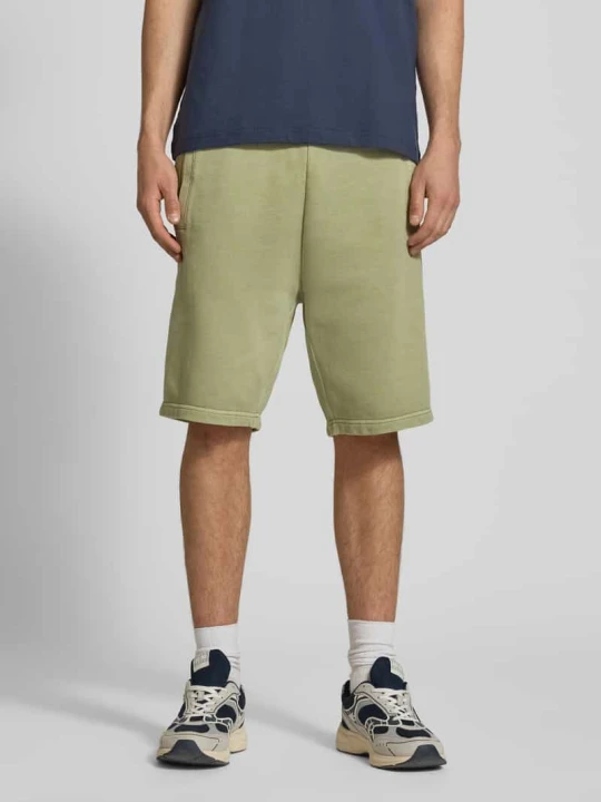 Zdjęcie produktu Szorty dresowe z wpuszczanymi kieszeniami model 'Nelson' Carhartt WIP Zielony