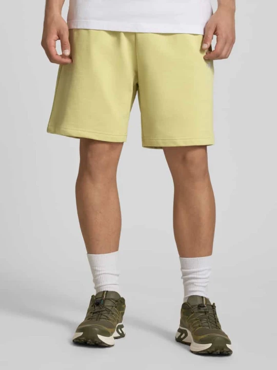 Zdjęcie produktu Szorty dresowe z wyhaftowanym logo The North Face Neonowy żółty