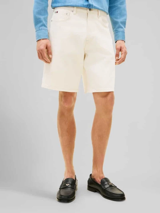 Zdjęcie produktu Szorty jeansowe krój regular fit model 'DOVER' Tommy Hilfiger Złamany biały