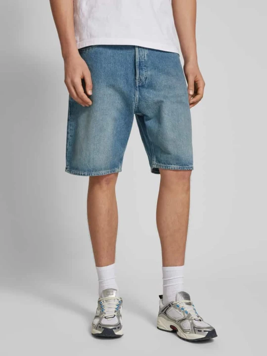 Zdjęcie produktu Szorty jeansowe o kroju baggy fit z przetarciami model ‘ALEX’ Jack&Jones Jeansowy niebieski