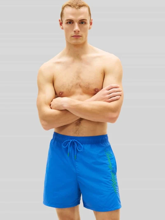 Zdjęcie produktu Szorty kąpielowe w kroju regular fit z naszywanym logo Tommy Hilfiger Królewski niebieski