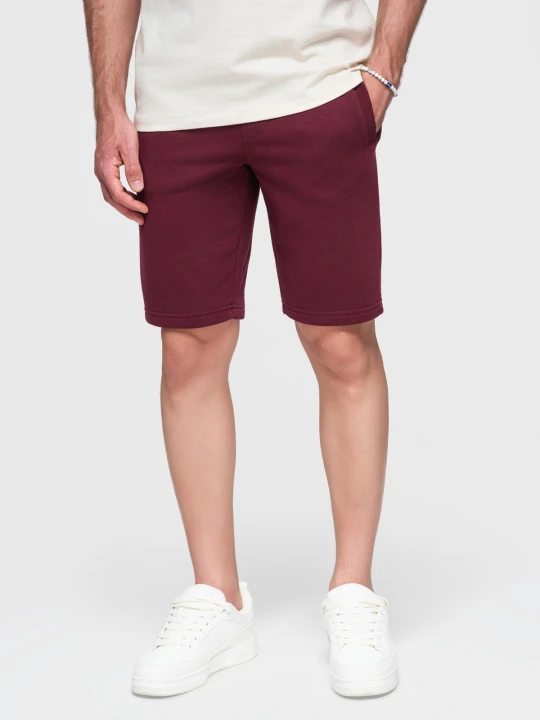Zdjęcie produktu Szorty męskie dresowe przed kolano BASIC – bordowe V3 - Rozmiar: M Ombre Clothing