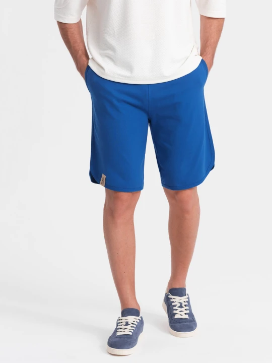 Zdjęcie produktu Szorty męskie dresowe z zaokrągloną nogawką - niebieskie V1 - Rozmiar: S Ombre Clothing