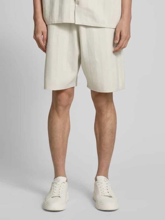Zdjęcie produktu Szorty o kroju regular fit z fakturowanym wzorem Calvin Klein Piaskowy