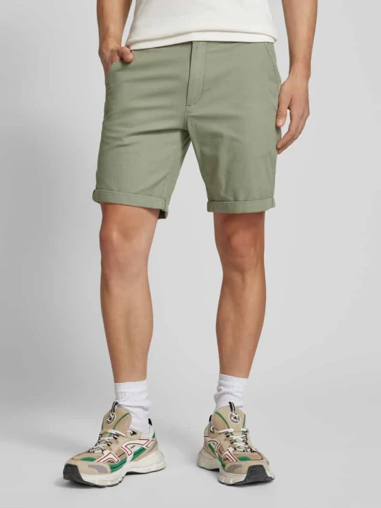 Zdjęcie produktu Szorty o kroju regular fit z fakturowanym wzorem model ‘FURY’ Jack&Jones Limonkowy