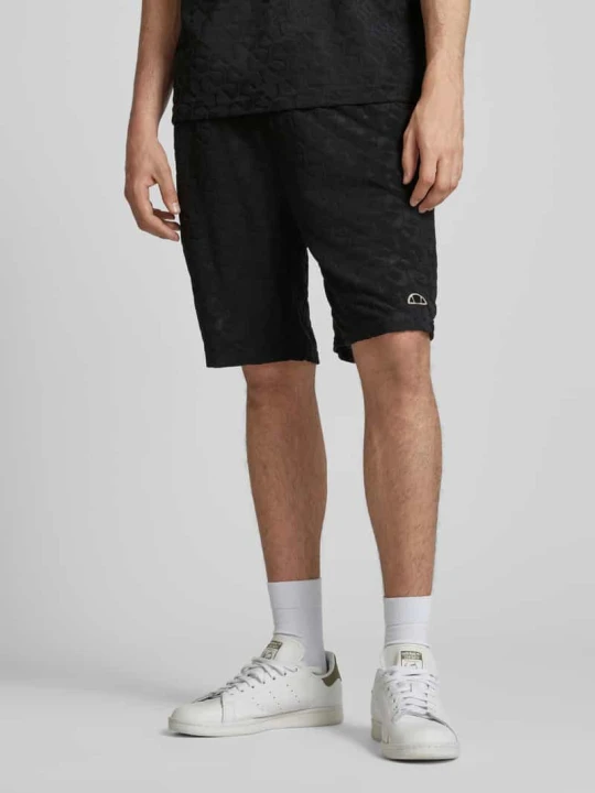 Zdjęcie produktu Szorty o kroju regular fit z fakturowanym wzorem model ‘VIZZANO’ Ellesse Czarny
