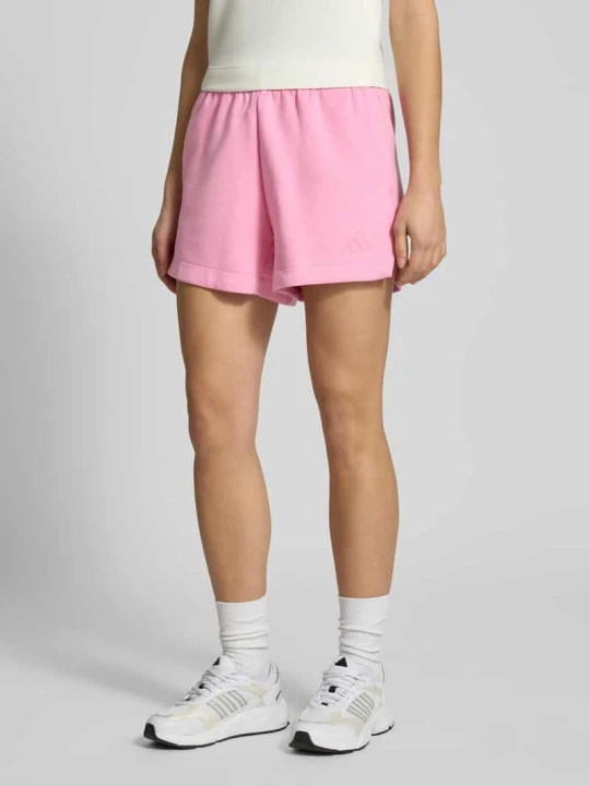 Zdjęcie produktu Szorty dresowe o kroju regular fit z nadrukiem z logo Adidas Mocnoróżowy