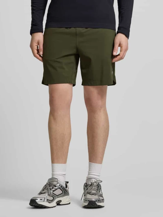 Zdjęcie produktu Szorty o kroju regular fit z nadrukiem z logo Fabletics Oliwkowy