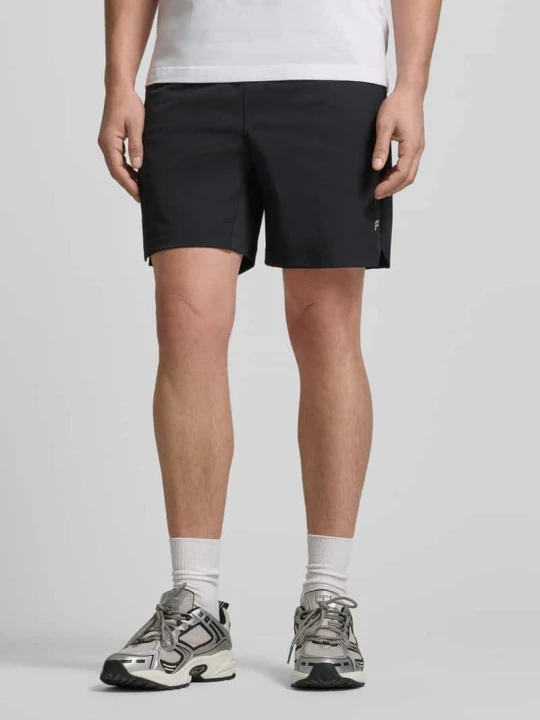 Zdjęcie produktu Szorty o kroju regular fit z nadrukiem z logo Fabletics Czarny