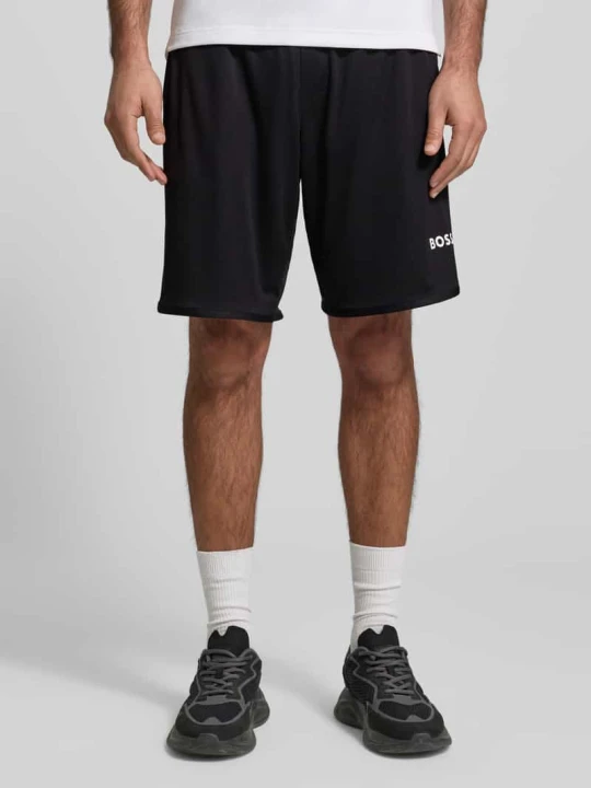 Zdjęcie produktu Szorty o kroju regular fit z napisem z logo model "TOC SPIN 9 INCH" Boss Czarny