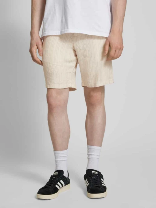Zdjęcie produktu Szorty o kroju regular fit z tunelem model ‘MYKONOS’ Jack&Jones Złamany biały
