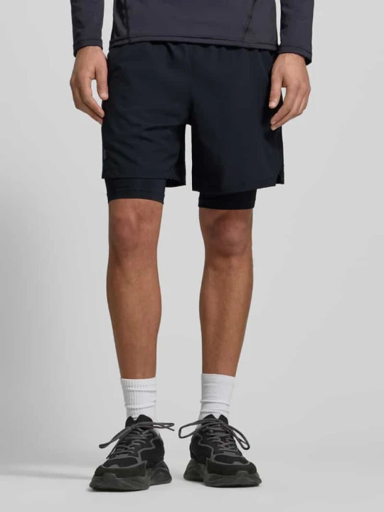 Zdjęcie produktu Szorty o kroju regular fit z wbudowanymi legginsami model 'Vanish' Under Armour Czarny