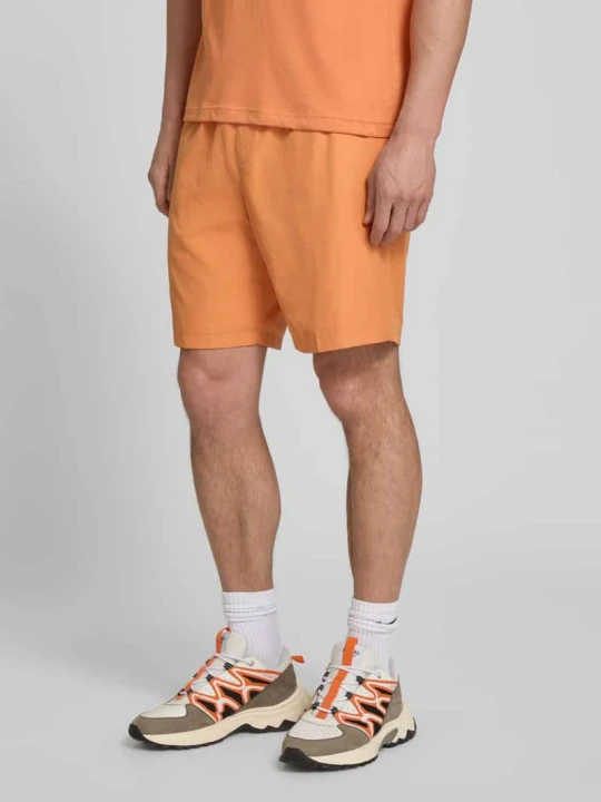 Zdjęcie produktu Szorty o kroju relaxed fit Sport z wyhaftowanym logo Lacoste Pomarańczowy