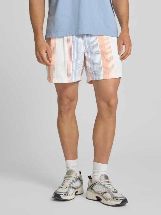 Zdjęcie produktu Szorty o kroju relaxed fit z czystej bawełny Tommy Jeans Pomarańczowy