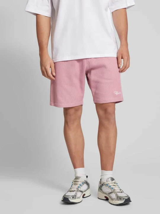 Zdjęcie produktu Szorty o kroju relaxed fit z efektem prążkowania model ‘SIGNAR’ Pegador Brudnoróżowy