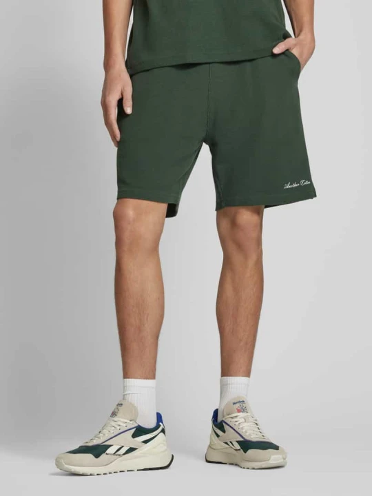 Zdjęcie produktu Szorty o kroju relaxed fit z fakturowanym wzorem Another Cotton Lab Ciemnozielony
