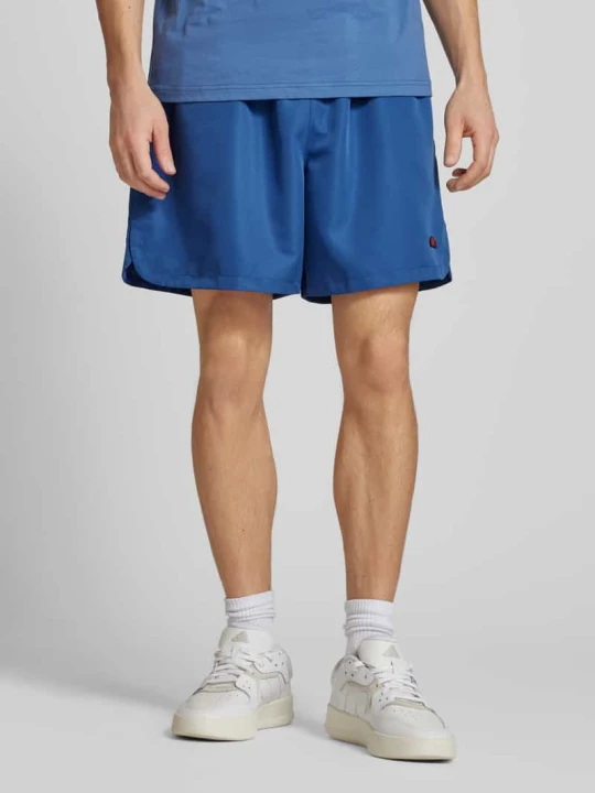 Zdjęcie produktu Szorty o kroju relaxed fit z naszywką z logo model ‘EAMES’ Ellesse Niebieski