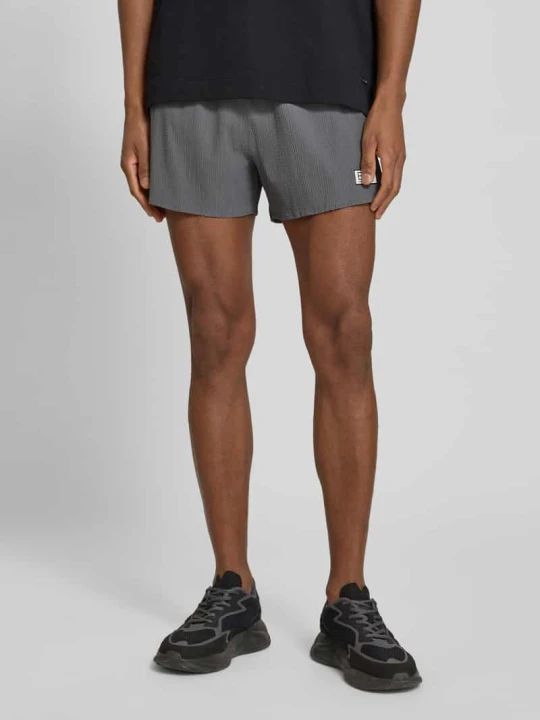 Zdjęcie produktu Szorty o kroju relaxed fit z wbudowanymi figami EA7 Emporio Armani Średnioszary