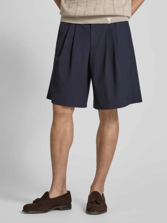 Zdjęcie produktu Szorty o kroju relaxed fit z zakładkami w pasie model ‘LIAM’ Selected Homme Ciemnoniebieski