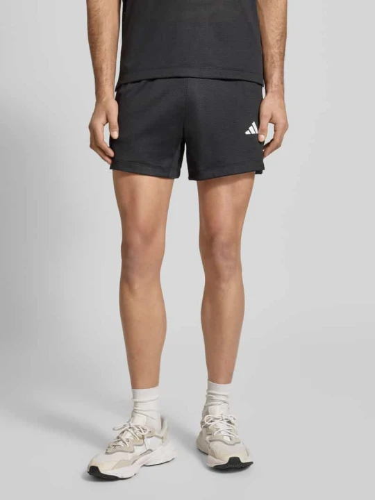 Zdjęcie produktu Szorty o kroju straight fit z nadruk z logo w siateczka Adidas Czarny
