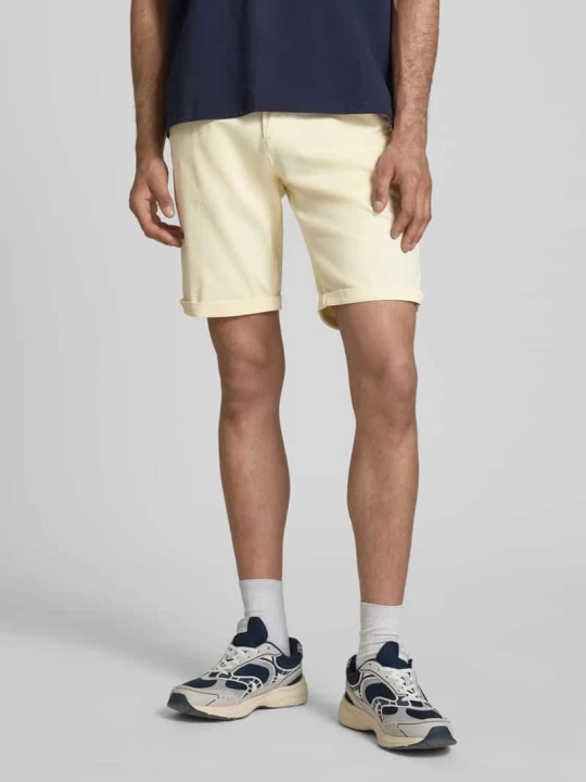 Zdjęcie produktu Szorty o kroju straight fit z wpuszczanymi kieszeniami model 'Bowie' Jack&Jones Jasnożółty