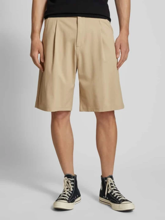 Zdjęcie produktu Szorty o kroju tailored fit z zakładkami w pasie REVIEW Beżowy
