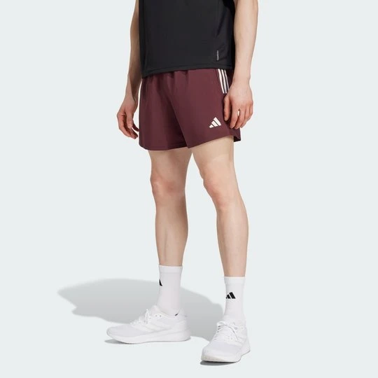 Zdjęcie produktu Szorty Own The Run Adidas Aurora Ruby