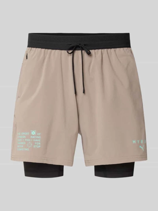 Zdjęcie produktu Szorty sportowe o kroju regular fit w stylu 2 w 1 model 'PUMA x HYROX DRYELITE'