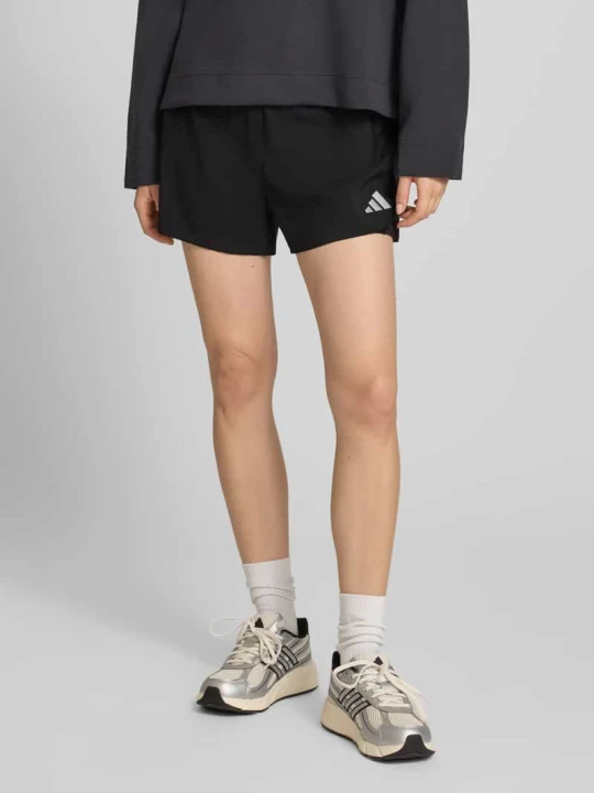 Zdjęcie produktu Szorty sportowe o kroju regular fit z detale z logo model 'Run Ess 21 S' Adidas Czarny