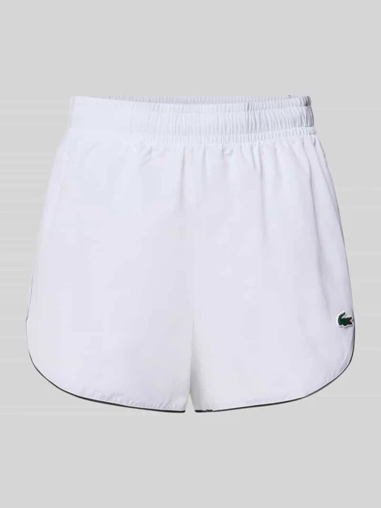 Zdjęcie produktu Szorty sportowe o kroju regular fit z elastycznym pasem Lacoste Biały