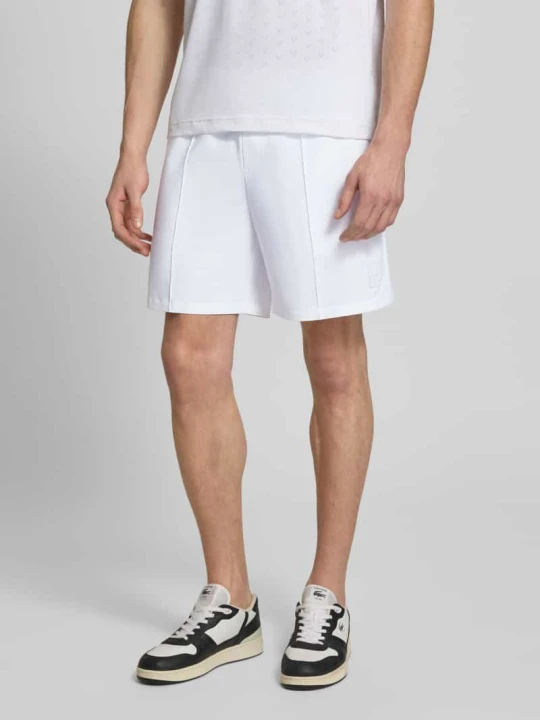 Zdjęcie produktu Szorty sportowe o kroju regular fit z elastycznym pasem Lacoste Biały
