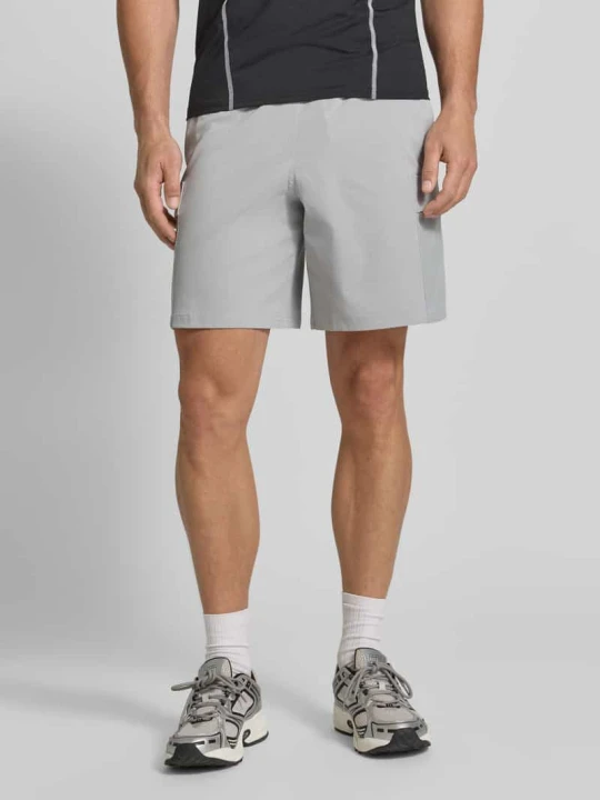 Zdjęcie produktu Szorty sportowe o kroju regular fit z kieszenią cargo model 'Unstoppable Airvent' Under Armour Średnioszary