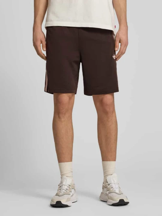 Zdjęcie produktu szorty sportowe o kroju regular fit z paskami w kontrastowym kolorze model 'FIREBIRD' adidas Originals
