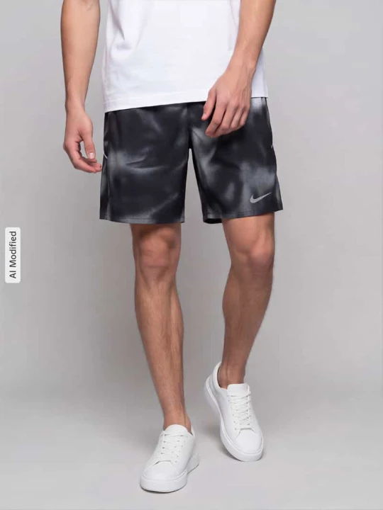 Zdjęcie produktu Szorty sportowe o kroju regular fit z technologia dri-fit model 'MILER' Nike Czarny