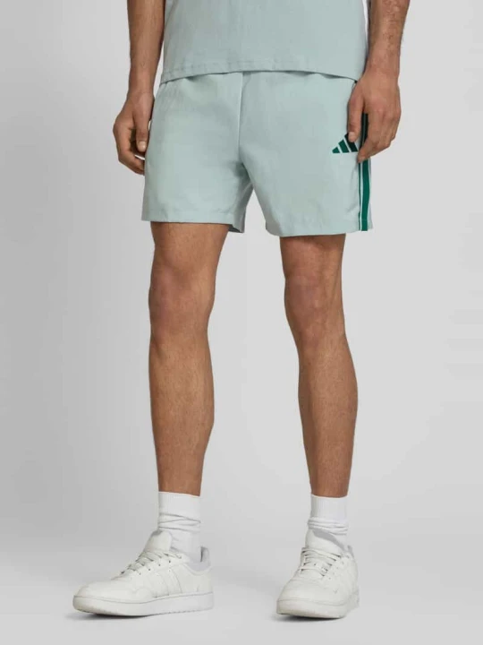 Zdjęcie produktu Szorty sportowe w kroju regular fit z kontrastowymi lamówkami model 'CHELSEA' Adidas Miętowy