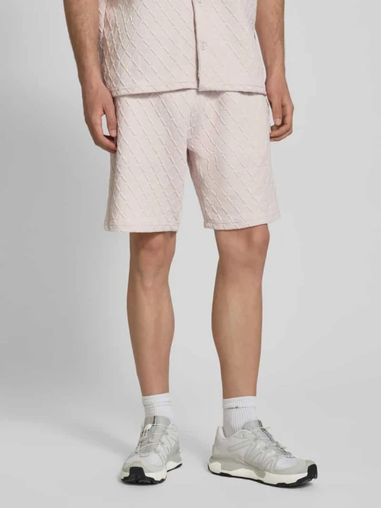 Zdjęcie produktu Szorty typu sweat o kroju relaxed fit z fakturowanym wzorem model 'Jovren' Pegador Jasnofioletowy