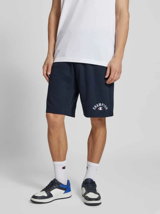 Zdjęcie produktu Szorty z dzianiny dresowej o kroju baggy fit z wyhaftowanym logo Champion Ciemnoniebieski