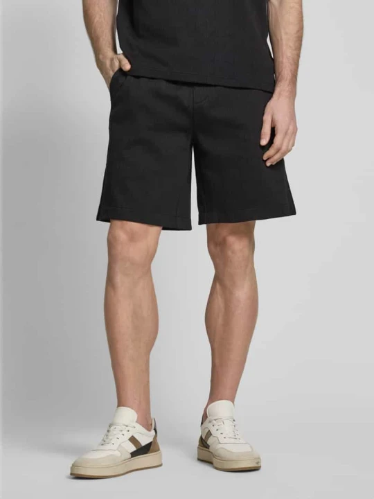 Zdjęcie produktu Szorty z dzianiny dresowej o kroju regular fit z detalem z logo Calvin Klein Czarny