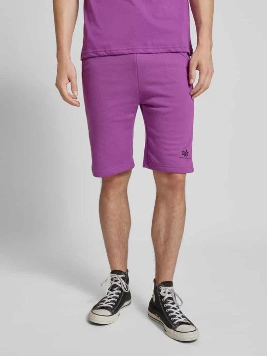 Zdjęcie produktu Szorty z dzianiny dresowej o kroju regular fit z nadrukiem z logo Alpha Industries Jasnośliwkowy