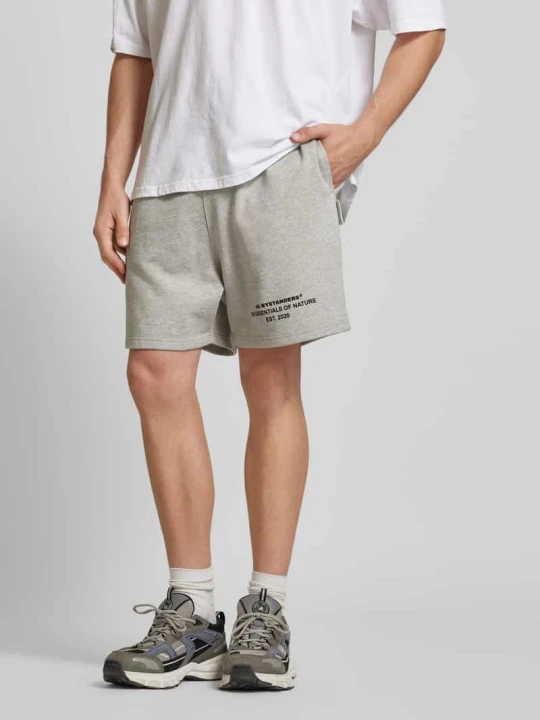 Zdjęcie produktu Szorty z dzianiny dresowej o kroju regular fit z nadrukiem z logo No Bystanders Jasnoszary melanż