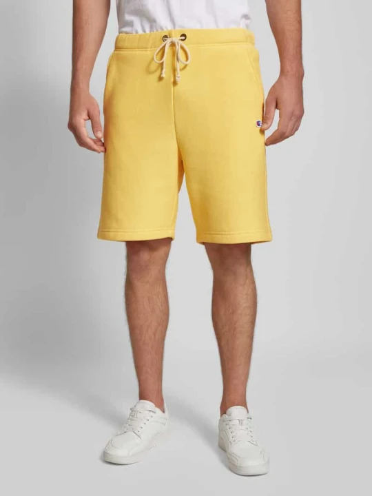 Zdjęcie produktu Szorty z dzianiny dresowej o kroju regular fit z naszywką z logo Champion Beżowy