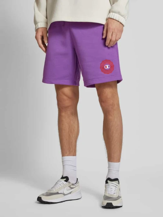 Zdjęcie produktu Szorty z dzianiny dresowej o kroju regular fit z naszywką z logo Champion Fioletowy