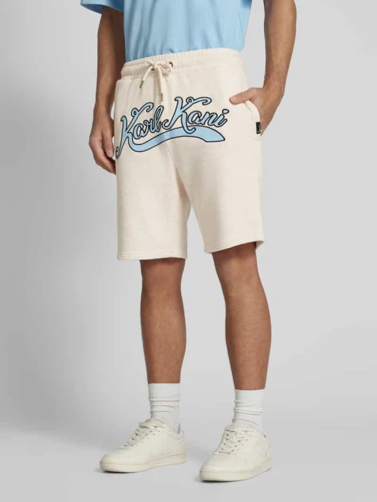 Zdjęcie produktu Szorty z dzianiny dresowej o kroju regular fit z wyhaftowanym logo Karl Kani Złamany biały
