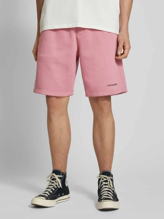Zdjęcie produktu Szorty z dzianiny dresowej o kroju relaxed fit z elastycznym pasem model ‘LOGO’ Pegador Brudnoróżowy